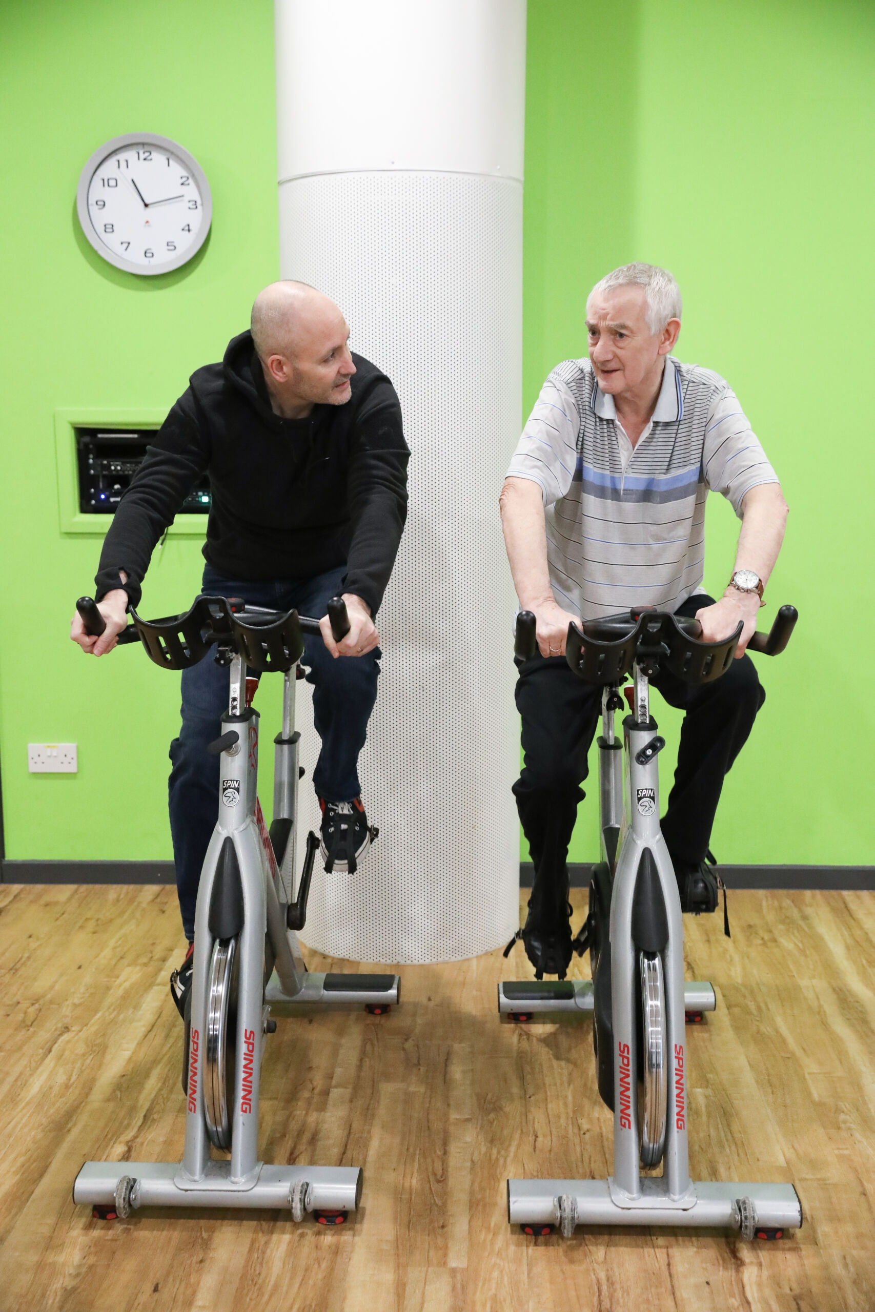 Two Prehab4Cancer participants on exercise bikes