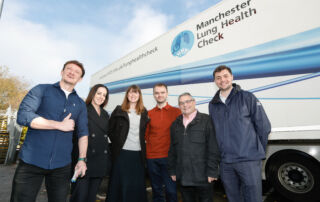 Staff outside the Targeted Lung Health Check truck in Hindley