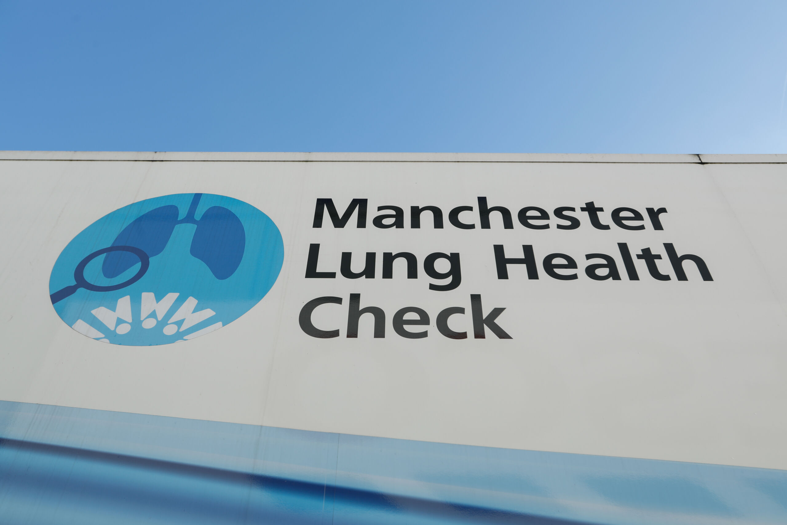 The side of a truck with the words the Manchester Lung Health Check