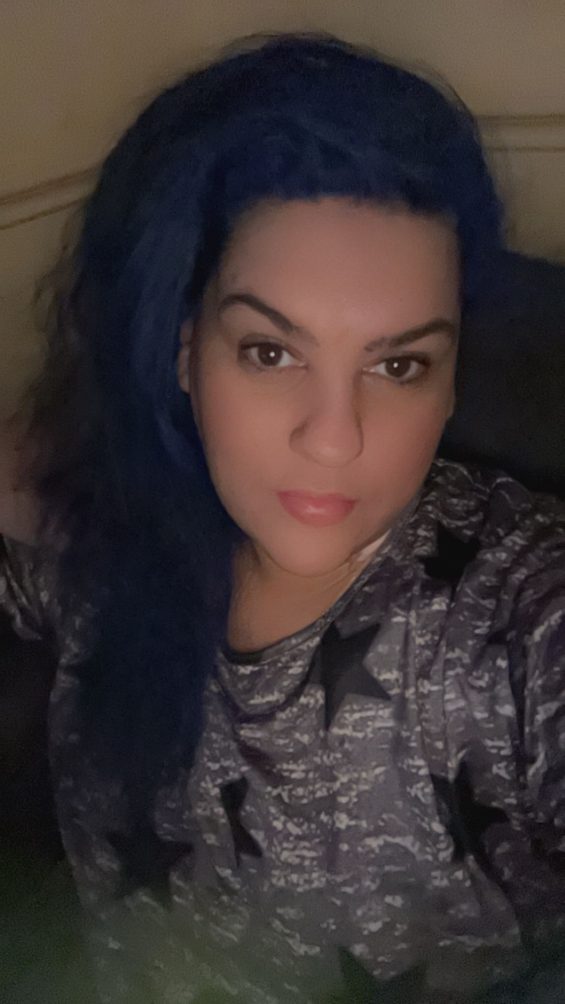 Photo of Siobhan Kennedy. She is a white woman with long dark hair and is looking at the camera. 