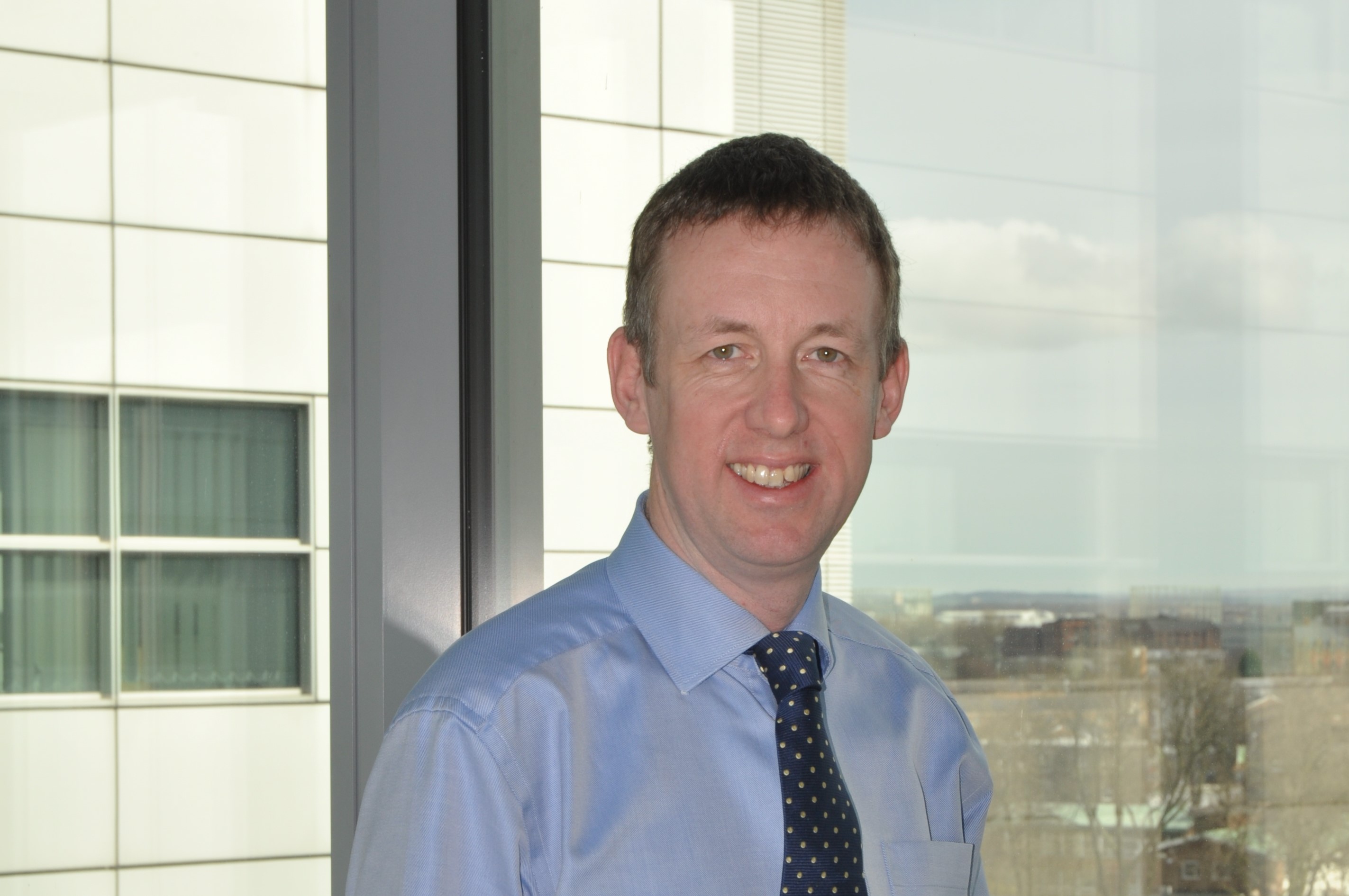 Headshot of Dr Richard Edmondson, Clinical Lead for Gynaecological Cancers at Greater Manchester Cancer Alliance